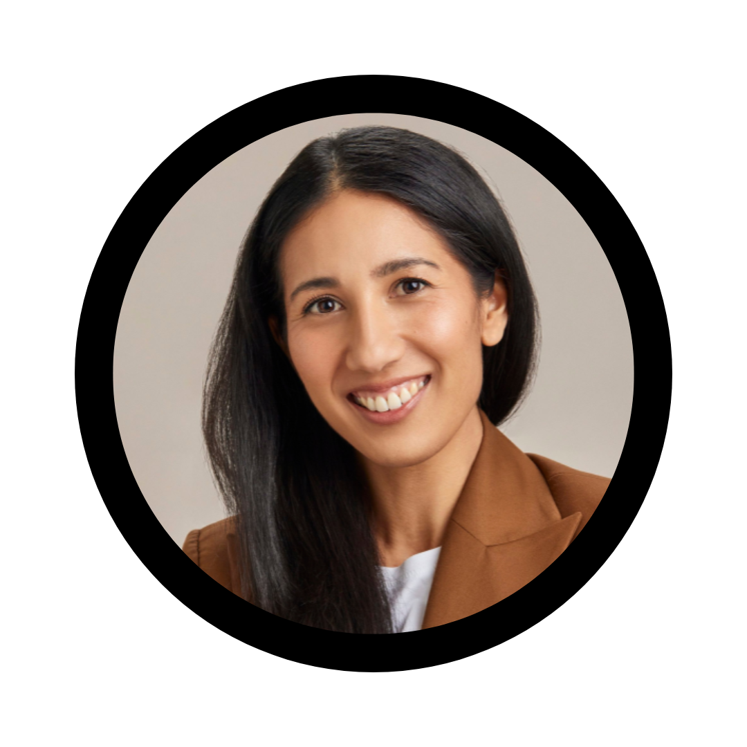 Small circle containing an image of Crystal Andrews. She has long dark hair pulled over one shoulder, is smiling wearing a brown blazer and white top. 