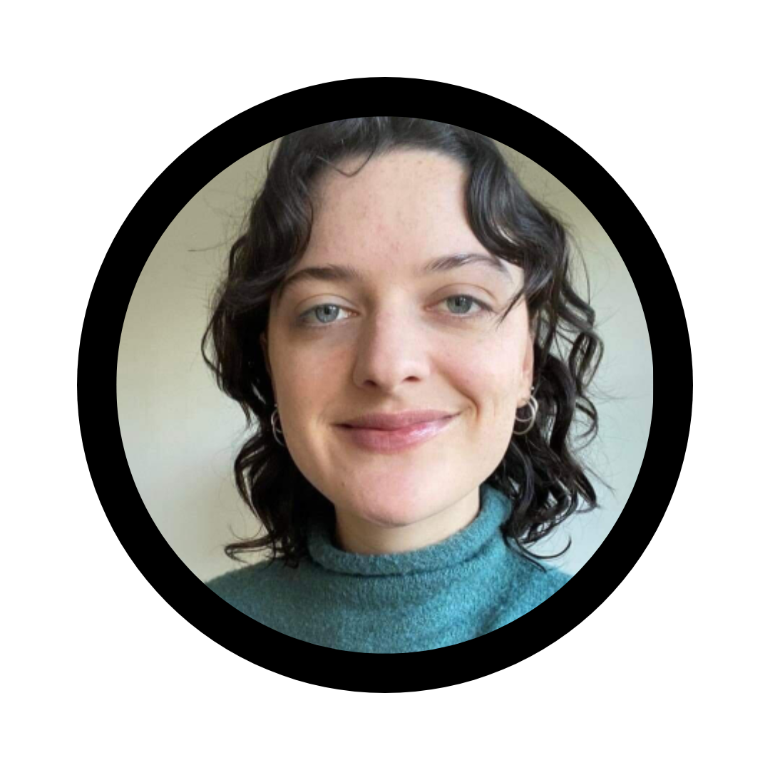 Small circle containing an image of Em Whittingstall. They have chin lenght, curly dark hair and are wearing a cozy, turquoise green jumper.