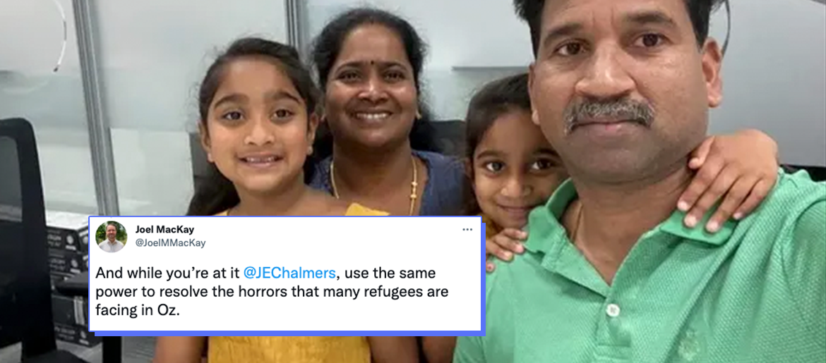 Image of the Murugappan family, from left to right: daughter Tharnicaa, mother Priya, daughter Kopika, and father Nades. Their arms are around each other, taking a selfie in a generic-looking office space. All are smiling, except for Nades who looks wary. 
